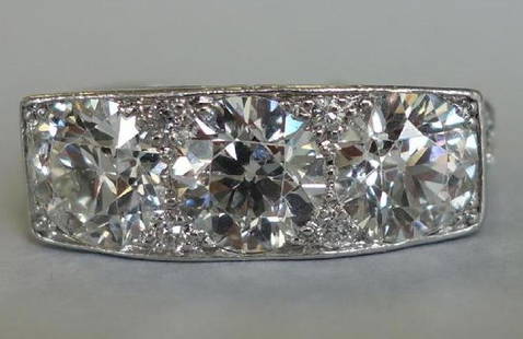 Ladies Platinum Diamond Ring, 4 Carats +: A ladies platinum and diamond ring of approximately 4.08 carats. The ring set with nineteen old European brilliant-cut diamonds, of the following approximate weights and measurements. One center diamo