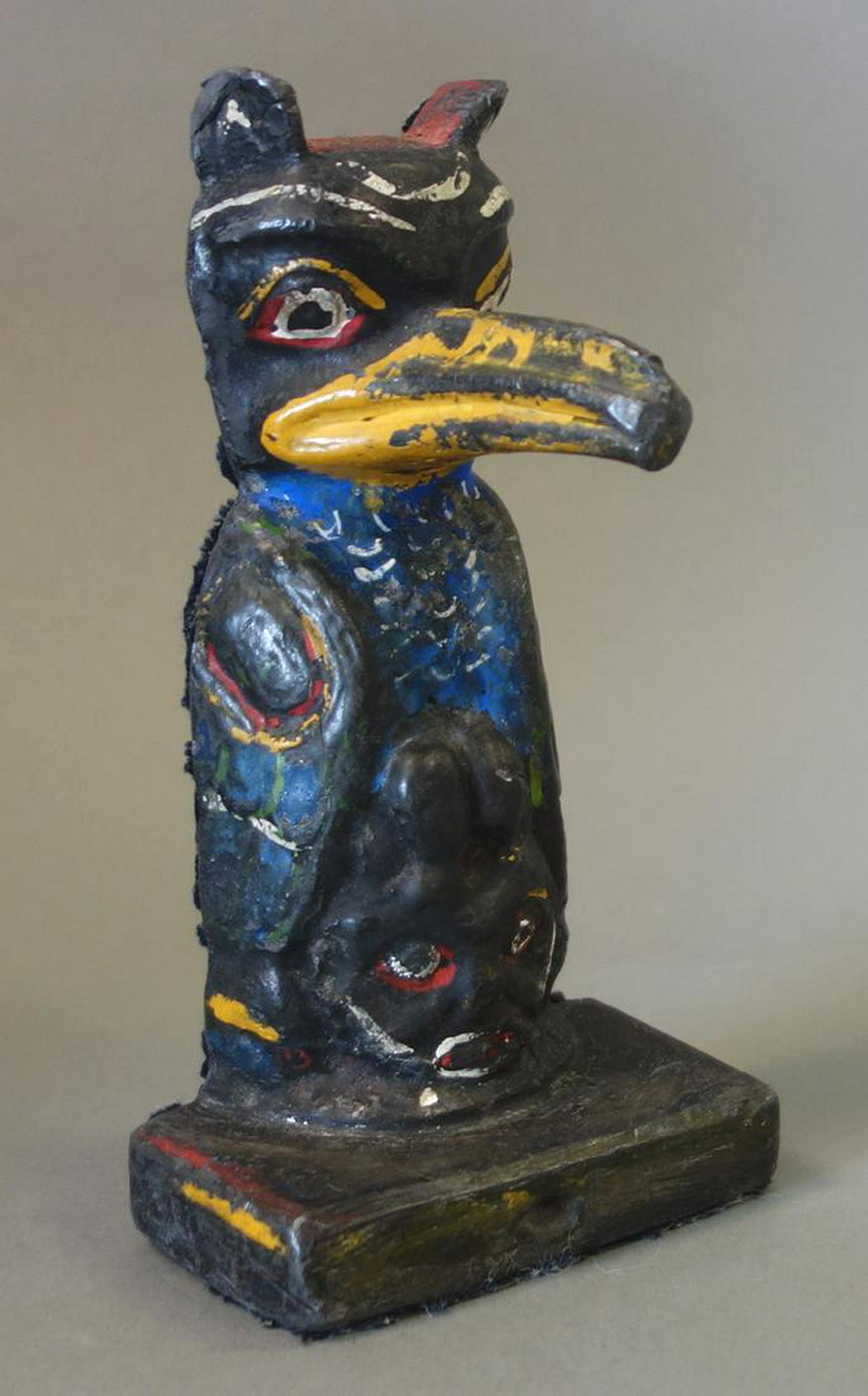 Painted Lead Totem, Thunderbird: A polychrome enamel painted lead totem. Depicts Thunderbird, the Native American omen of warfare, associated with the sound of thunder. Measures 5-7/8" high, 3" wide, 1-5/8" deep.