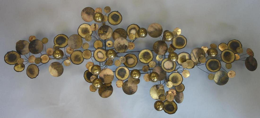 Curtis Jere (1910-2008) Raindrop Sculpture, Signed: A Curtis Jere (1910-2008) wall sculpture. From the Raindrop series, 1975. Brass sculpture measuring 61" x 29" x 7" deep. Signed C. Jere', 1975.