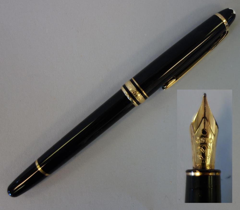 Mont Blanc Meisterstuck Classic Fountain Pen +: A Montblanc Meisterstuck Classic fountain pen. The 14K gold nib marked 4810, 14K Montblanc 585. Black resin case with gold-plated accents and surmounted by a white star emblem. Measures 5-3/8" long. C