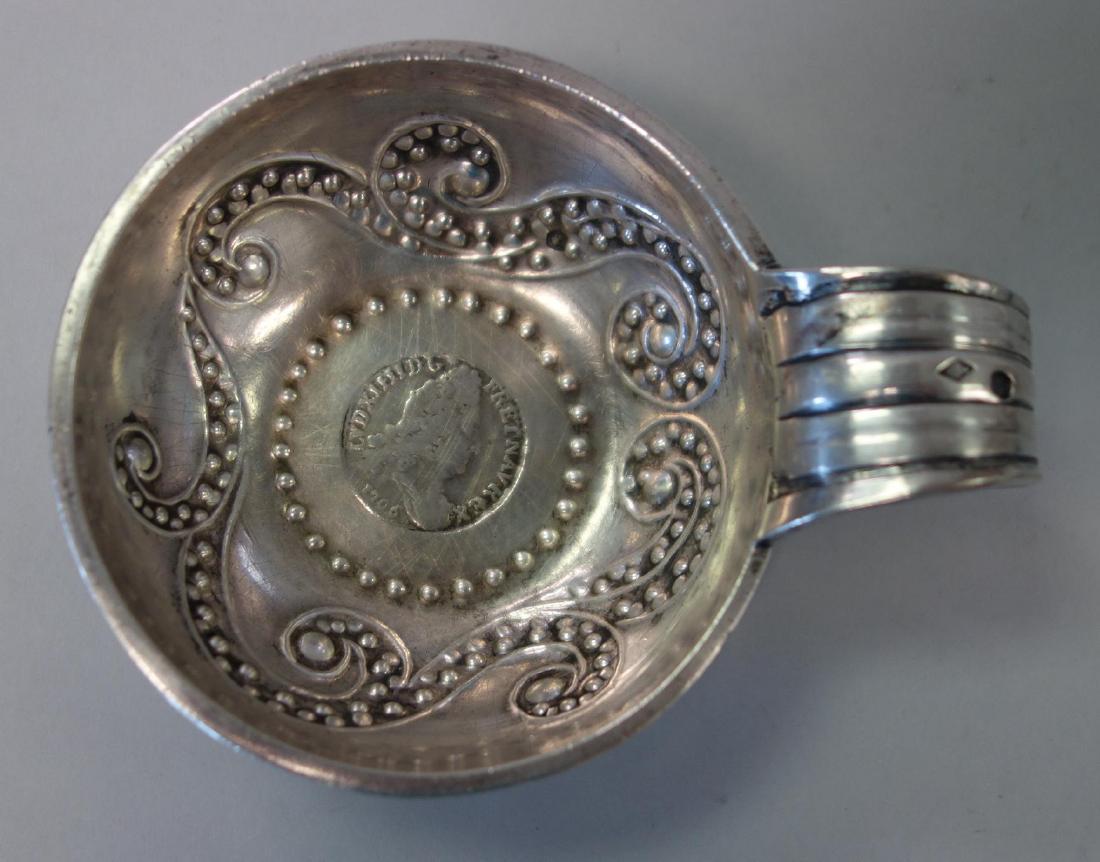19thc French Silver Wine Tasting Cup w/ 1706 Coin: A 19th century French silver sommelier wine tasting cup. The center inset with a Louis XIV, silver coin, dated 1706. Hallmarked for Cesar Tonnelier c.1845-1882. The exterior engraved J. Poisson, Cobre