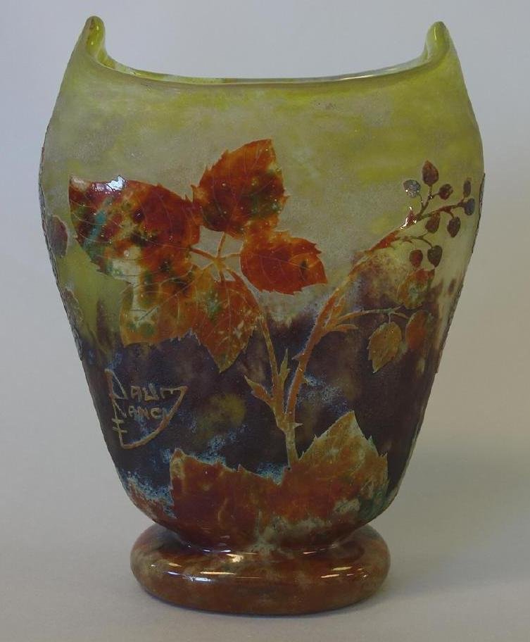 Daum Nancy Cameo Glass Vase, Blackberry Motif: A fine French Daum Nancy art glass vase, c.1910-20s. Cameo glass acid cut back vase having a tapering design with oval foot and depicting a spectacular motif using strong colors and showing large leav