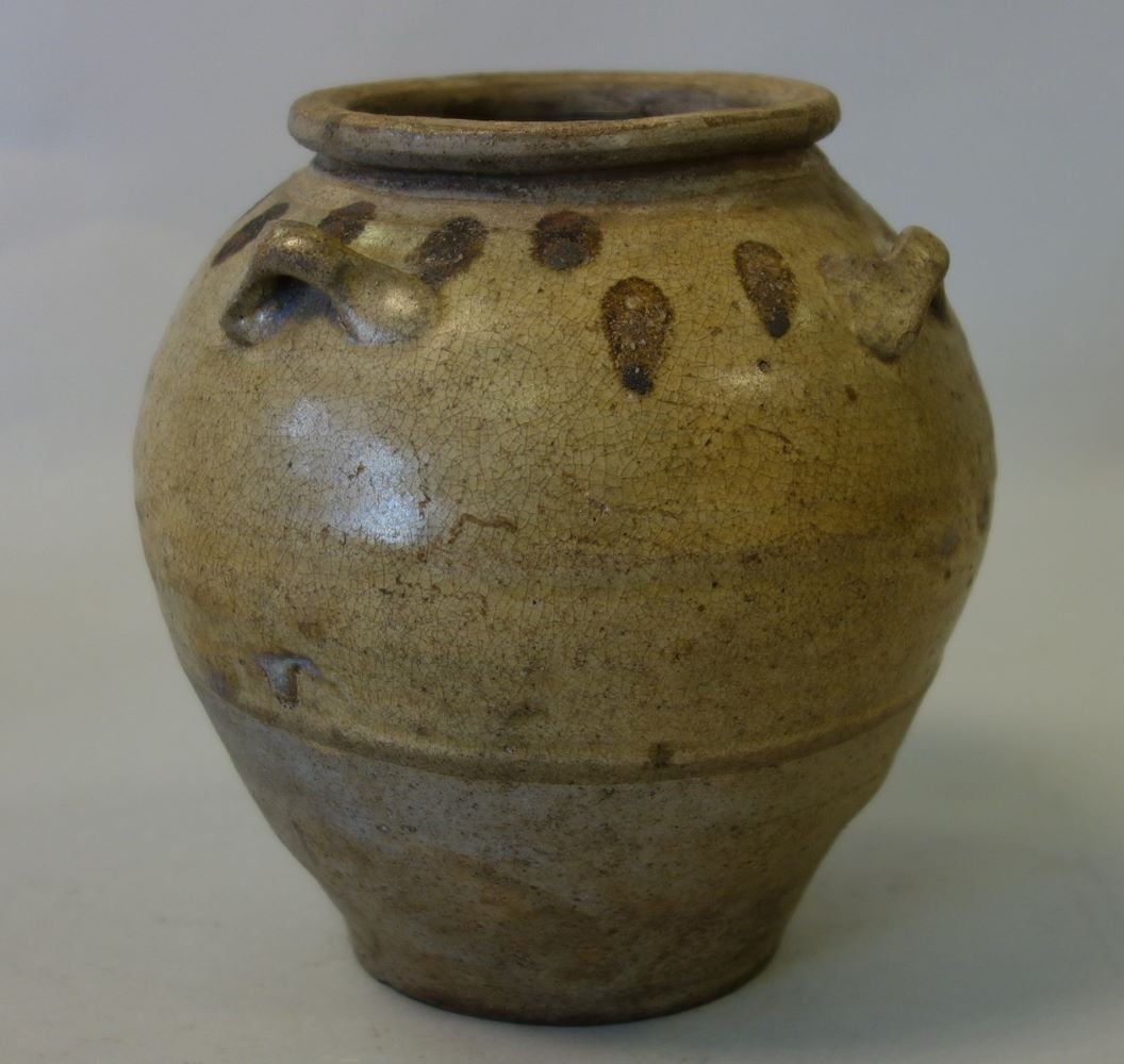 Chinese Stoneware Jar, Lug Handles, Song Dynasty: A Chinese stoneware jar. Song Dynasty. Ochre glaze with black / brown iron spots, four lug handles. Measures 6-5/8" high, 6.5" diameter.