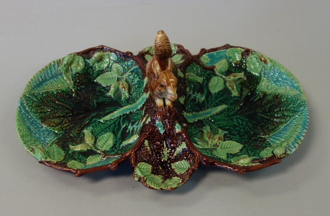 George Jones Majolica Squirrel Double Nut Dish: A 19thc century English majolica double nut dish by George Jones, Stoke on Trent, 19th century. Large double sided nut dish centered with a detailed squirrel. Front and rear small dish receptacles. St