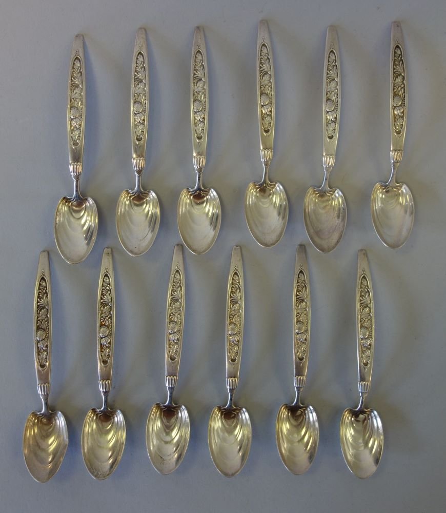 12 Whiting Sterling Spoons, Art Nouveau Ptn: A set of 12 sterling silver demitasse / coffee spoons by the Whiting Mfg Co in an Art Nouveau pattern. 4.5" long. No monograms. Overall weight, 155 grams.