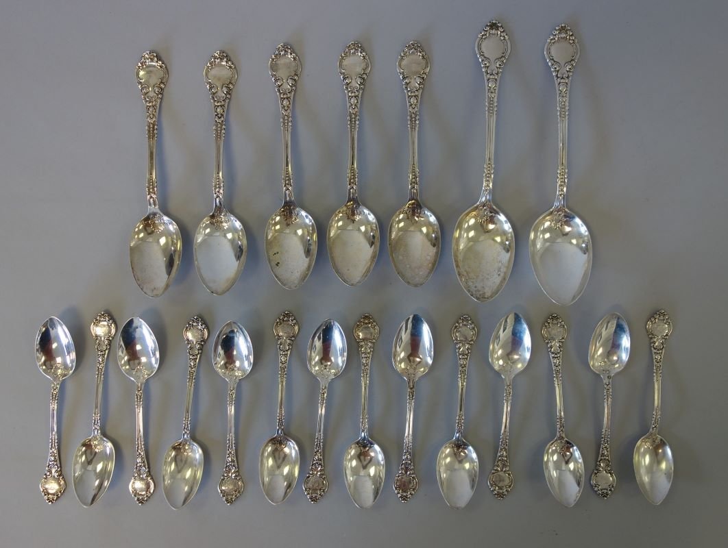 Sterling Spoons, Various Sizes, Wendell Mfg: A group of American sterling silver spoons by Wendell Mfg Co. Comprised of 14 teaspoons, 5 table / soup spoons and 2 serving spoons (8" long). A total of 21 pieces. Stylized initial monogram on the te
