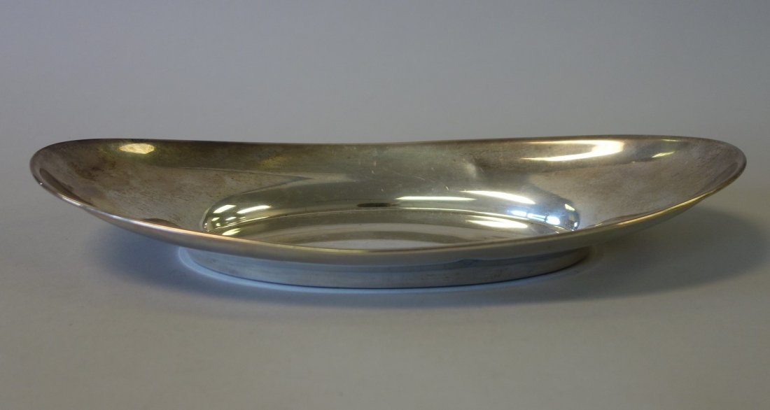 Gorham Sterling Bread Serving Tray: An American sterling silver bread serving tray by Gorham, pattern 4463. The oval tray measures 12" x 6" x 1.75" high. Weighs 231 grams.