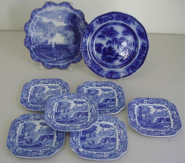 Copeland Spode Italian Plates & Staffordshire: Comprised of six Copeland Spode small plates measuring 5.75" square in the Italian pattern, one scalloped edged Staffordshire scenic plate measuring 9.25" in diameter, unsigned, and one ironstone flow