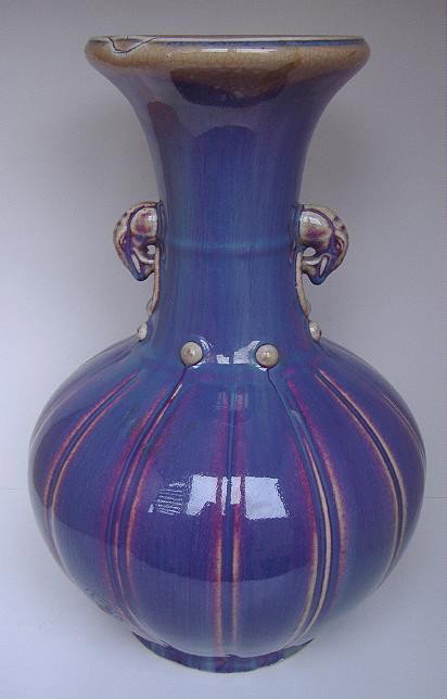 19thc Chinese Flambe Sung Dynasty-Style Vase: Vase of Chun Yao ware (Sung Dynasty-style) measuring 14.5" tall and having elephant formed handles. Note: Firing lines at rim.