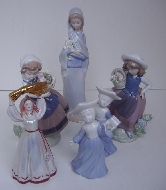 Figurines: 3 Lladro, 1 USSR & 2 Porcelain Nuns: Porcelain grouping comprised of three Llardo figurines, a Russian female marked Made in the USSR and two porcelain nuns.