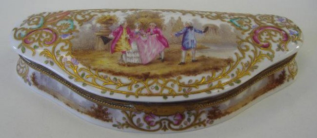German Porcelain Dresser Box,Crossed Swords Mark: Porcelain dresser box with a hand-painted central scene depicting a young woman with her lady in waiting being courted by two men. The box measures 8.5" long, 3.5" deep and 1.5" high. NOTE; The cover 