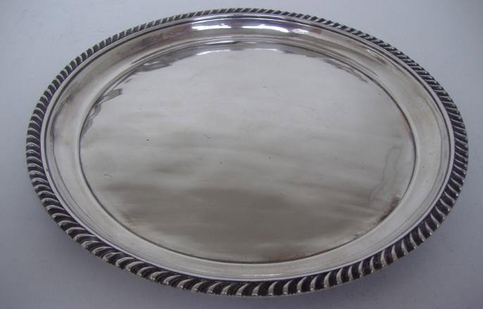 Russian Silver Tray, St. Petersburg, 1825-1938: The tray measures 7-7/8" in diameter and is well hallmarked. Includes the mark of Michael Kardinsky. Weighs 7.67 troy ozs.