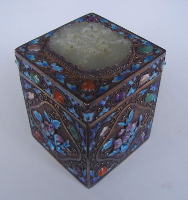 Chinese Silver-Gilt Box, Carved White Jade Plaque: Chinese silver-gilt square lidded box. The lid with a white nephrite jade plaque carved with shou character and flowers. The lid and base are adorned with quartz, carnelian & glass cabochons and with