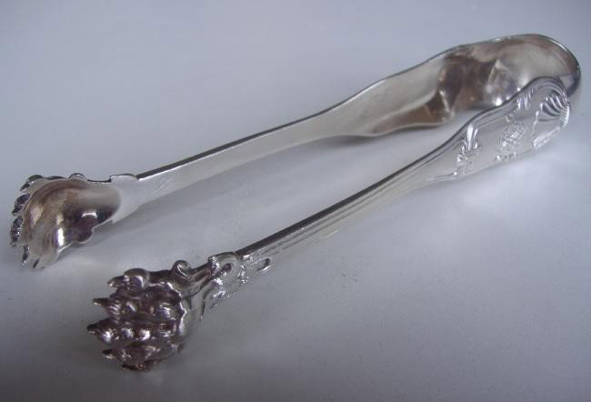 Emile Puiforcat French Sterling 950 Sugar Tongs: Well designed sugar tongs with paw feet and shell motif. Measures 6" long, has the Emile Puiforcat mark and the Minerva 1 mark for .950 silver. Weighs 2.57 troy oz.