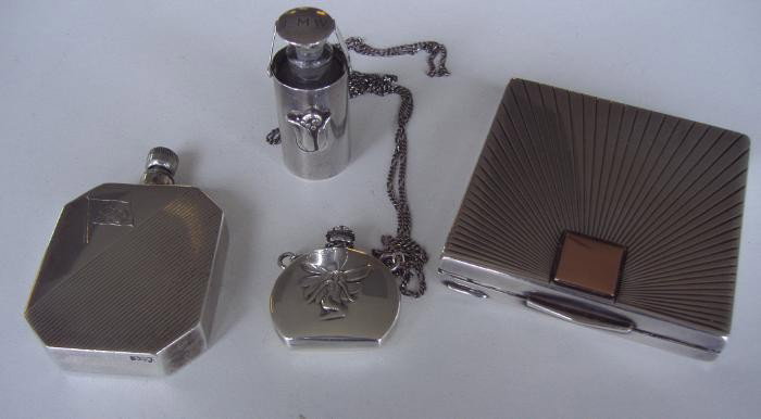 3 Art Nouveau Sterling Scent Perfumes & Compact 14K: Includes a sterling scent bottle with a Georg Jensen-Style design by Wells, together with a sterling scent bottle with fairy motif, a Scandinavian perfume, marked 835J and an Art Deco sterling compact