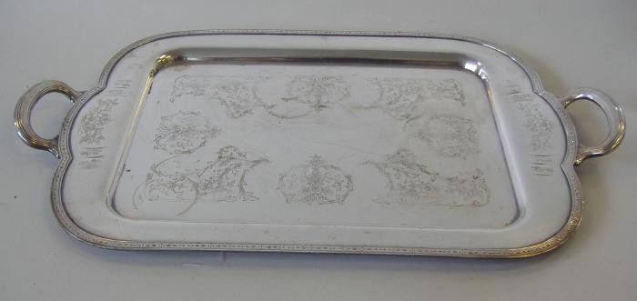 Silverplated Serving Tray 'Chelsea': Serving tray by Community Plate in the Chelsea pattern with etched floral and swag motif. The platter measures 26.75" from handle to handle and 15.5" wide. NOTE: some surface scratching.
