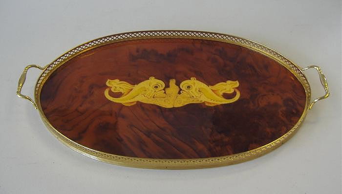 Mahogany Serving Tray with Inlay of Dolphins: The tray surrounded by a brass gallery measures 20.5" from handle to handle and 12" across.