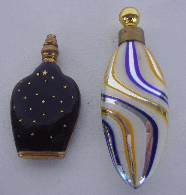 Two Mercury Glass & Enamel Perfume Scent Bottles: Two miniature scent bottles. One in black enamel with gold stars, together with a German blue, white & yellow mercury glass bottle.
