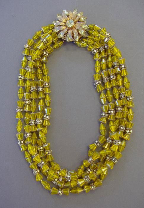 Miriam Haskell Multi Strand Beaded Necklace: Elegant Miriam Haskell multi strand beaded necklace with floral-formed clasp. Signed.
