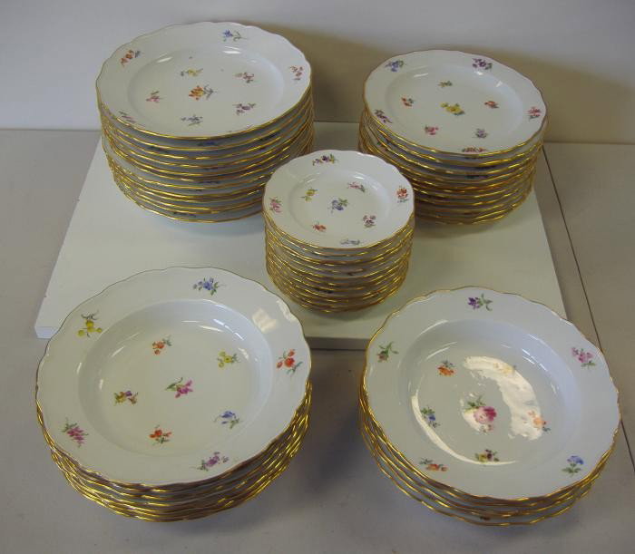 Meissen Floral Porcelain Dinner Service 48 pcs: Comprised of 12 dinner plates, 12 bread and butter plates, 12 salad or dessert plates and 12 soup bowls.