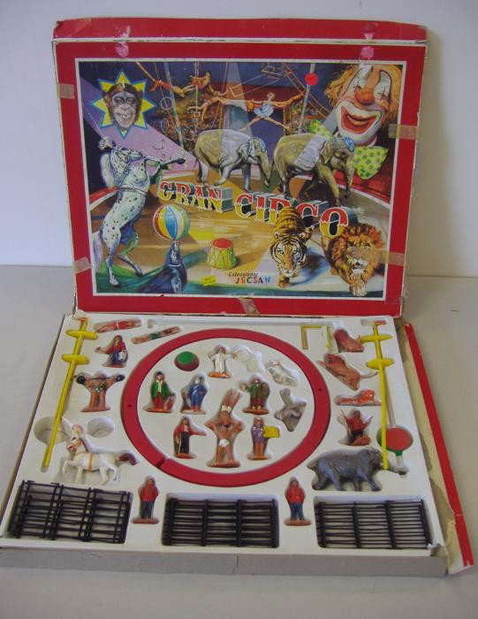 Circo Jecsan, Grand Circus Toy Set: A box full of circus figures, animals , clowns, etc. Everything you will need to put on your own miniature circus. NOTE: missing two minor stands and one pole. The box has partial damage.