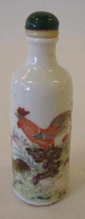 Chinese Famille Rose Rooster Snuff Bottle: Measures 3.5" tall. Chinese porcelain snuff bottle, well decorated with Roosters in a flowering field. NOTE: spoon broken, see photos.