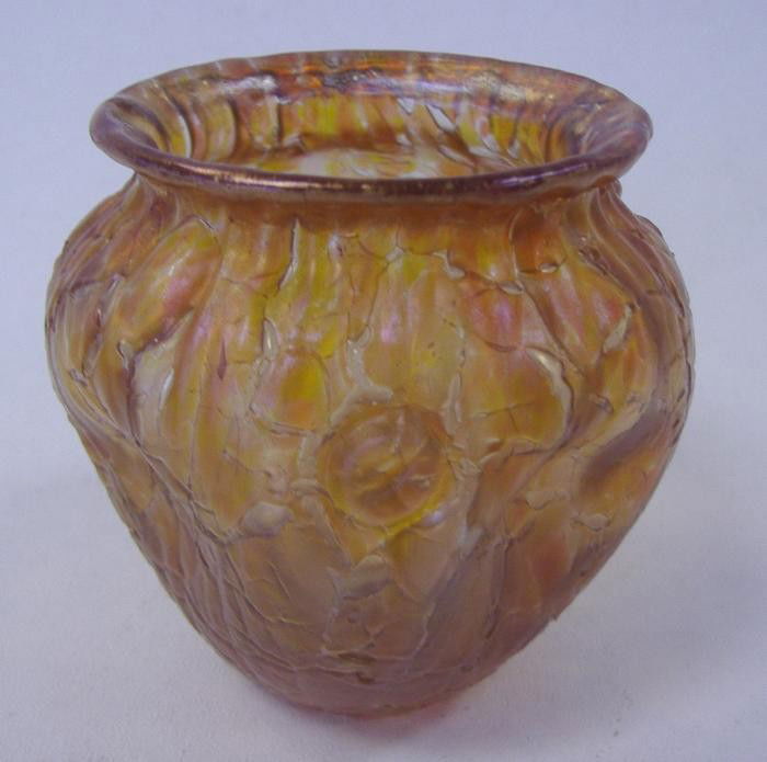 Loetz Bohemian Art Glass Vase: Loetz Bohemian art glass vase with pinched sides. Measures 3.25" high and 3.5" in diameter. Excellent overall condition. No chips or cracks.