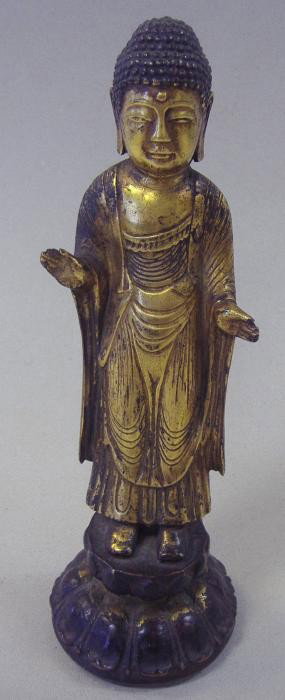 Antique Korean Silla Type Bronze Sculpture: An antique gilt bronze figure of Buddha Shakyamuni, Korea. The overall measurement of the bronze, 8.5" tall.