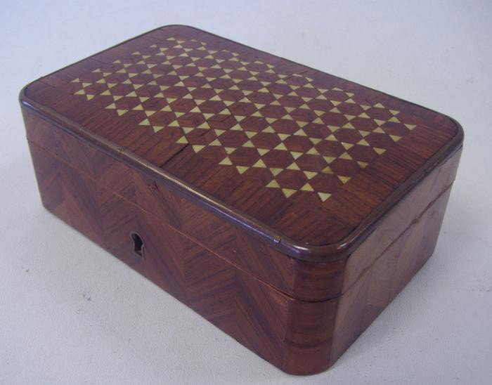 19thc Wood Parquetry Box w/ Ivory Inlay: 19thc wood parquetry box inlaid with ivory. The box measures 5.5" wide, 3.5" deep and 2" tall. Lined interior. Has lock/no key.