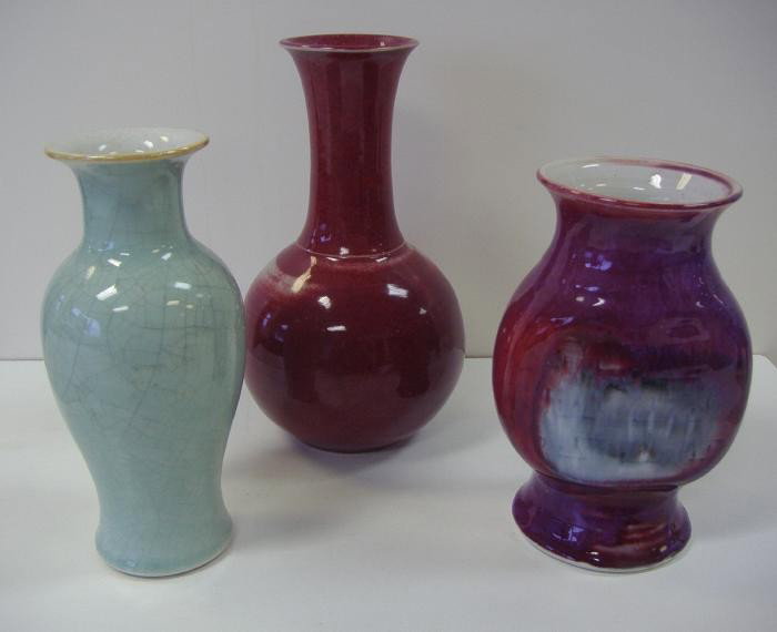 3 Chinese Vases, Celadon, Flambe & Ox Blood: The ox blood-glazed vase measuring 9.25" tall. The celadon crackle-glazed vase measures 8" tall and the flambe vase measures 7.25" tall. All 20thc.