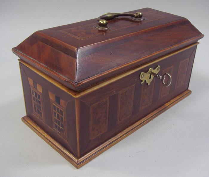 19thc Tea Caddy Chest in the Form of a House: Mid 19th century multiple wooded tea caddy chest in the form of a house. The house-formed caddy has five windows of birds-eye maple. The back is designed with a front door flanked on each side by two 