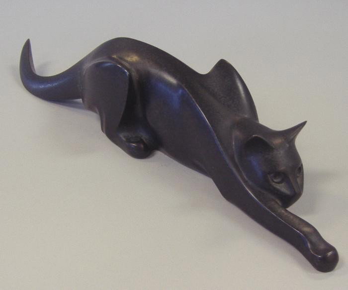 Alan Collins (1928-) Bronze "Stalking Cat": Bronze cat, titled " Stalking Cat" by noted international sculptor Alan Collins, (Born in the County of Surrey, England). This bronze measures 15.75" long and is signed by the artist on the underside.