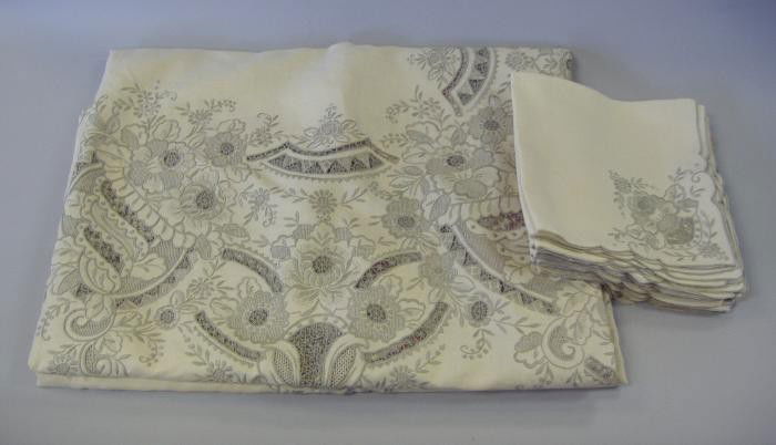 Linen & Needlepoint Tablecloth and 12 Napkins: Linen & needlepoint table cloth measuring 132" x 66", together with twelve napkins measuring 19" x 18".