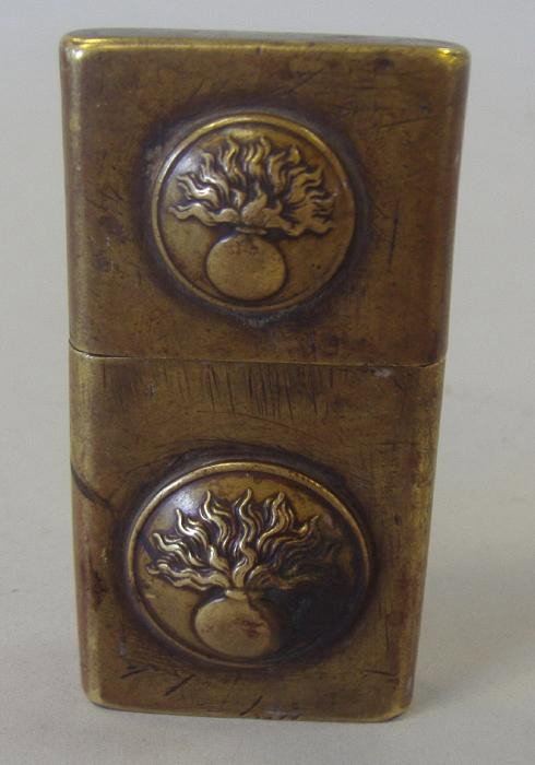 World War II Brass Lighter: Unmarked lighter. Measures 2-5/8" long and 1.25" wide. See photos for further description.