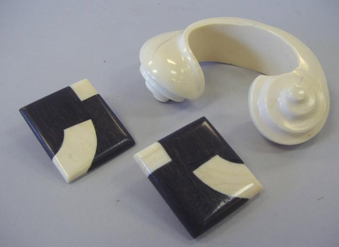 Patricia Von Musulin Ivory Cuff Bracelet, Earrings: Ivory cuff bracelet by jewelry designer Patricia Von Musulin. This sculptural piece measures 9" around the outside and 1" across. An inside curvature of 5" and an opening of 1". Together with a pair o