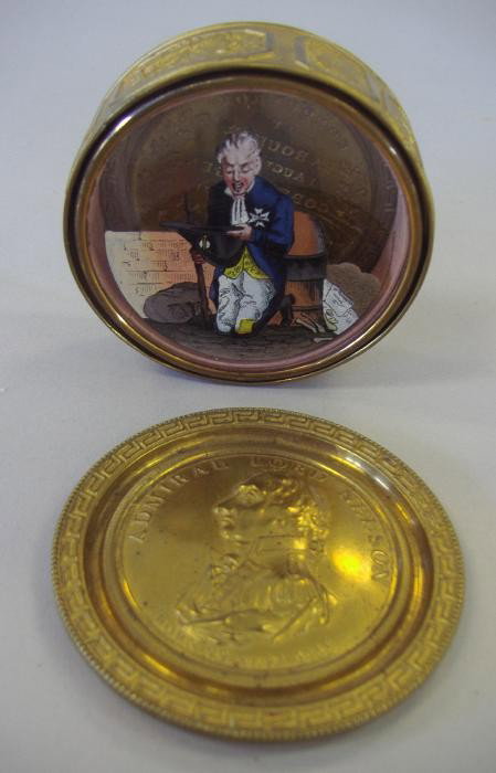 Admiral Lord Nelson Snuff Box w/ Interior Painting: Brass snuff box commemorating Admiral Lord Nelson. The interior has a glass and brass round box with a transfer painting of Lord Nelson kneeling (this glass box does not appear to open). See photos fo