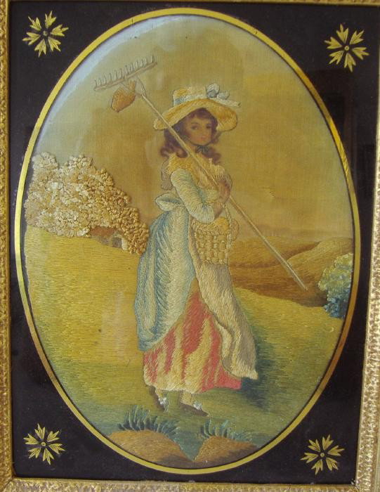 19thc English Needlework Picture in Eglomise Frame: English needlework picture of a young woman tending to her garden. Worked in various stitches. Housed in a gilt-wood and eglomise glass frame. The oval picture measures 9" x 6.5". The overall framed m