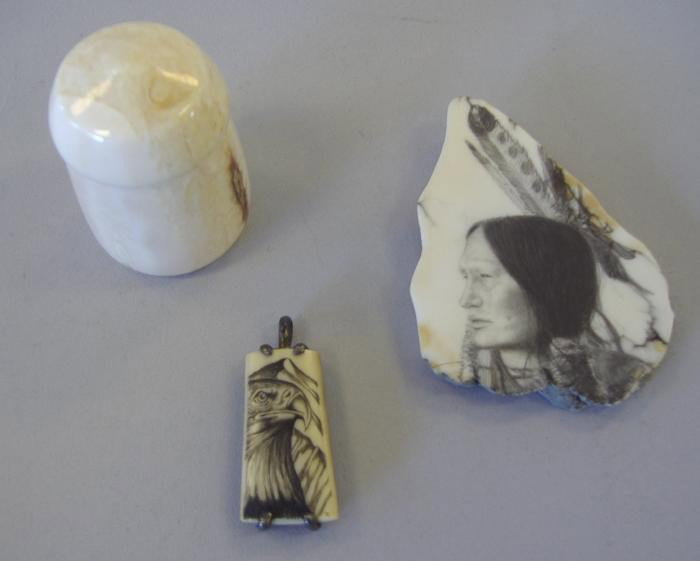 Scrimshaw Eagle, Sioux Drawing, Walrus Ivory Box: Scrimshaw pendant set in sterling depicting an eagle, together with a walrus ivory box and a drawing on stone of a Native American Indian, signed Running Antelope, Hunk Pa Pa Sioux. The pendant measur