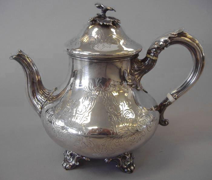 Sterling Teapot, London, 1848, Reily & Storer: Sterling teapot hallmarked for London, 1848, Charles Reily & George Storer. Measures 8" tall. Weighs, 19.14 troy oz.