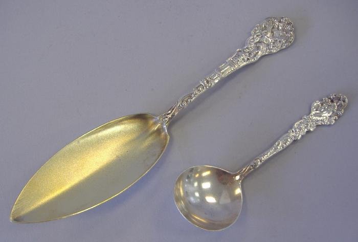 Gorham Sterling Pastry Server & Spoon, Versailles: Gorham sterling serving utensil with gold wash, together with a small spoon in the Versailles pattern. The server measures 8.25" long and the spoon measures 5" long. Overall weight of the two, 2.69 tr