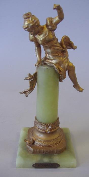 Gilt Metal & Onyx Figure La Picoree, Ferville Suan: Gilt-metal and onyx figural sculpture titled La Picoree, par Ferville (after Charles George Ferville Suan 1847-1925). Measures 8" tall. The base measuring 3" x 3".