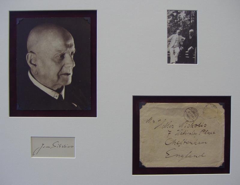 Homage to Sibelius, Autographs, Photos, Envelope: Framed homage to Jean Julius Sibelius (1865-1957). Includes an autographed photo (also his written name on the back of photo), an autographed card, a photo of Sibelius with his friend composer Heller 