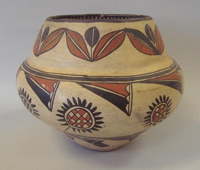 San Ildefonso Polychrome Olla Jar c1880s-1900: Measures 10.5" high and 13.5" in diameter at the widest point on the body. Some chips to rim. See photos for further description.