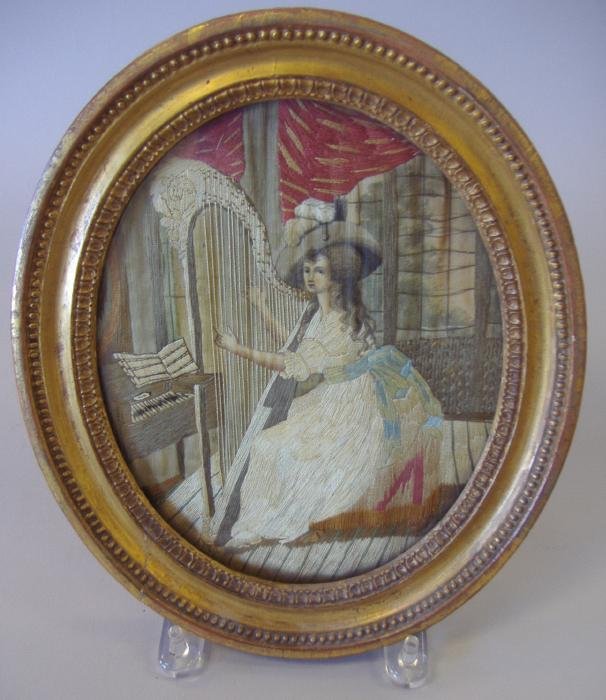 19thc English Needlework, Young Woman & Her Harp: Framed English needlework picture of a young woman playing the harp. Framed measurement, 11" x 9".