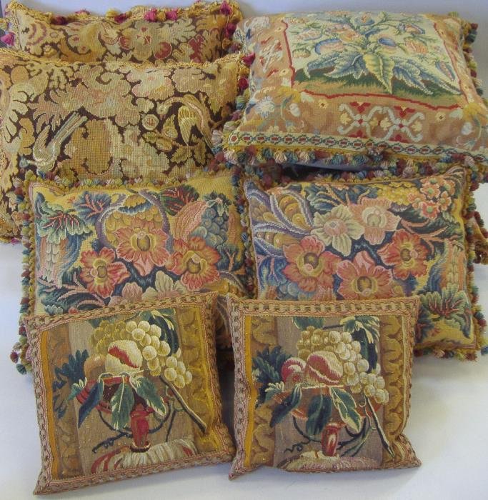 Eight Tapestry & Needlework Throw Pillows (4 sets): Four sets of two tapestry and needlework throw pillows, (total of eight pillows). One set measuring 26" x 22" . Another set measuring 24" x 20" and a smaller set measuring 15" x 13". The needlework pi
