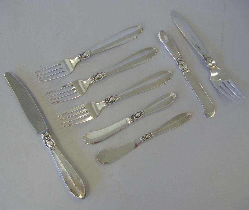 Georg Jensen Cactus & Frigast Sterling Flatware: Georg Jensen, Denmark, sterling silver fork and butter spreader in the Cactus pattern, together with Frigast, Denmark sterling flatware in the Princess Fuchsia pattern, comprised of 3 forks measuring 