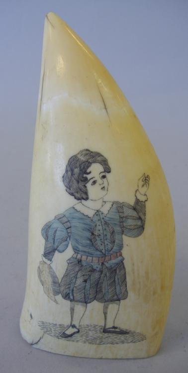 19thc Polychrome Scrimshaw Whale's Tooth: 19thc ivory scrimshaw whale's tooth depicting a young boy. Measures 6" high.