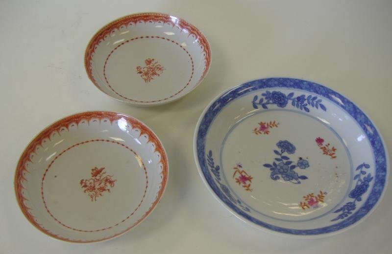 3-19thc Chinese Porcelain Qing Dynasty Dishes: Pair of 19thc Chinese export porcelain dishes with copper orange enamel decoration. The dishes each measure 5.5" in diameter and 1.25" high. Together with a blue and white Qianlong (1736-1795) dish wi