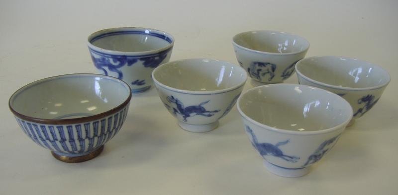 6 Chinese Qing Dynasty Tea Bowls Horse Motif, Sgnd: 4 Chinese blue and white tea bowls with horse decoration, signed with a 6-character mark. NOTE: two with hairlines/repairs and two in good condition. Together with a two Kangxi tea bowls, both signed.