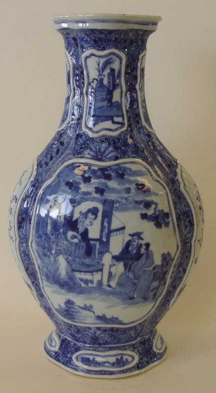 Chinese Porcelain Blue & White Vase, Kangxi Mark: Large Chinese Qing Dynasty porcelain vase with under-glaze decoration depicting scenes of mandarin life. Signed underfoot with a Kangxi mark, although most likely 19thc. Measures 17" tall, 10" wide an